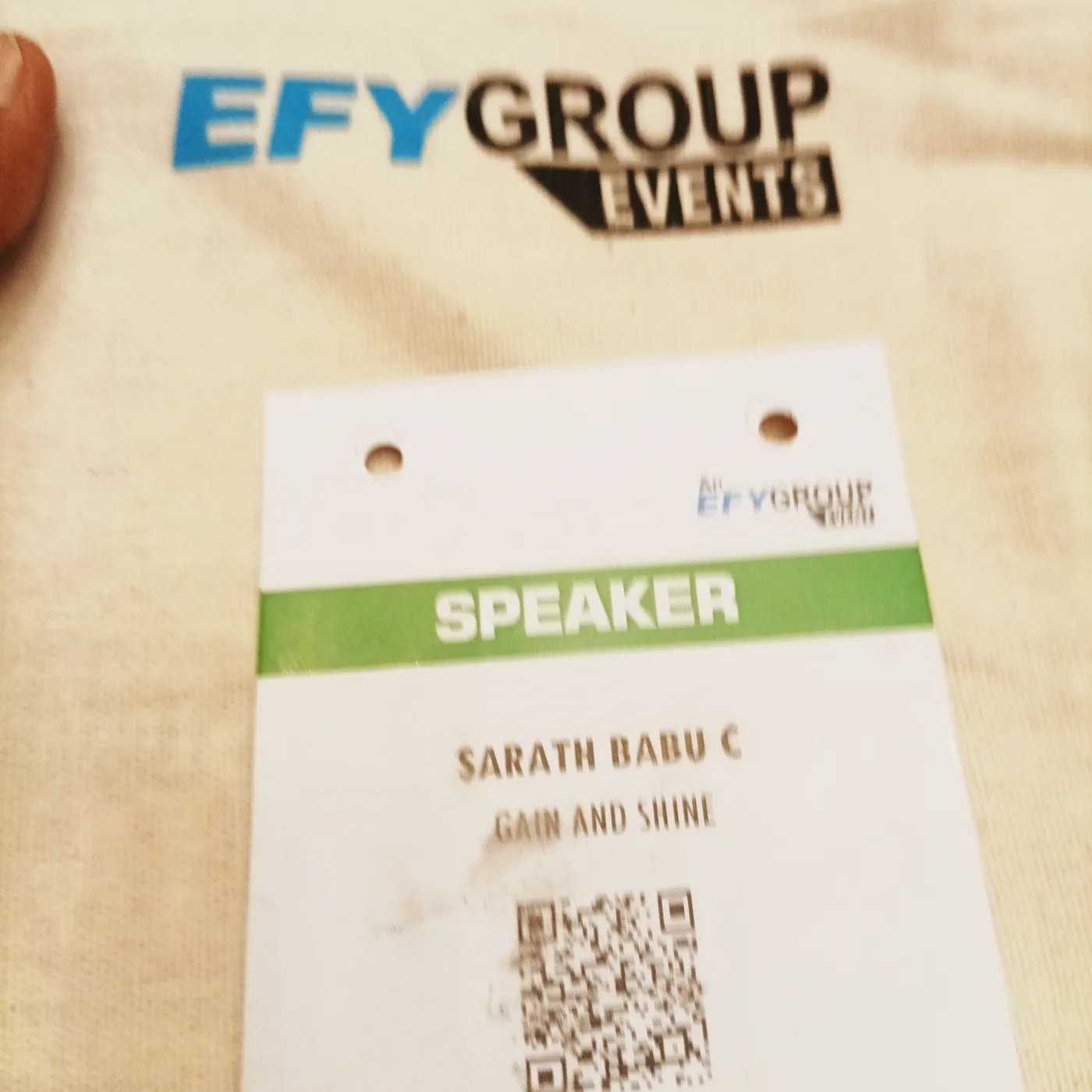 C Sarath Babu's AIDevCon India 2026 speaker pass reading Sarath Babu C, Gain and Shine, on an EFY Group t-shirt