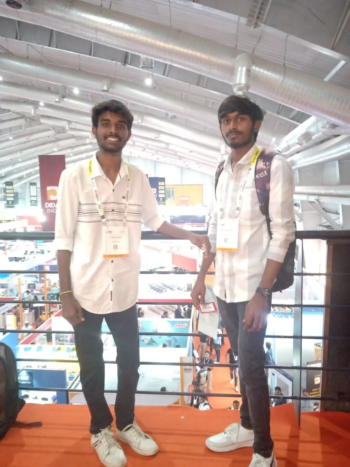 C Sarath Babu's writing on DIDAC INDIA 2023. Sarath and Pavan on the balcony above the exhibition floor
