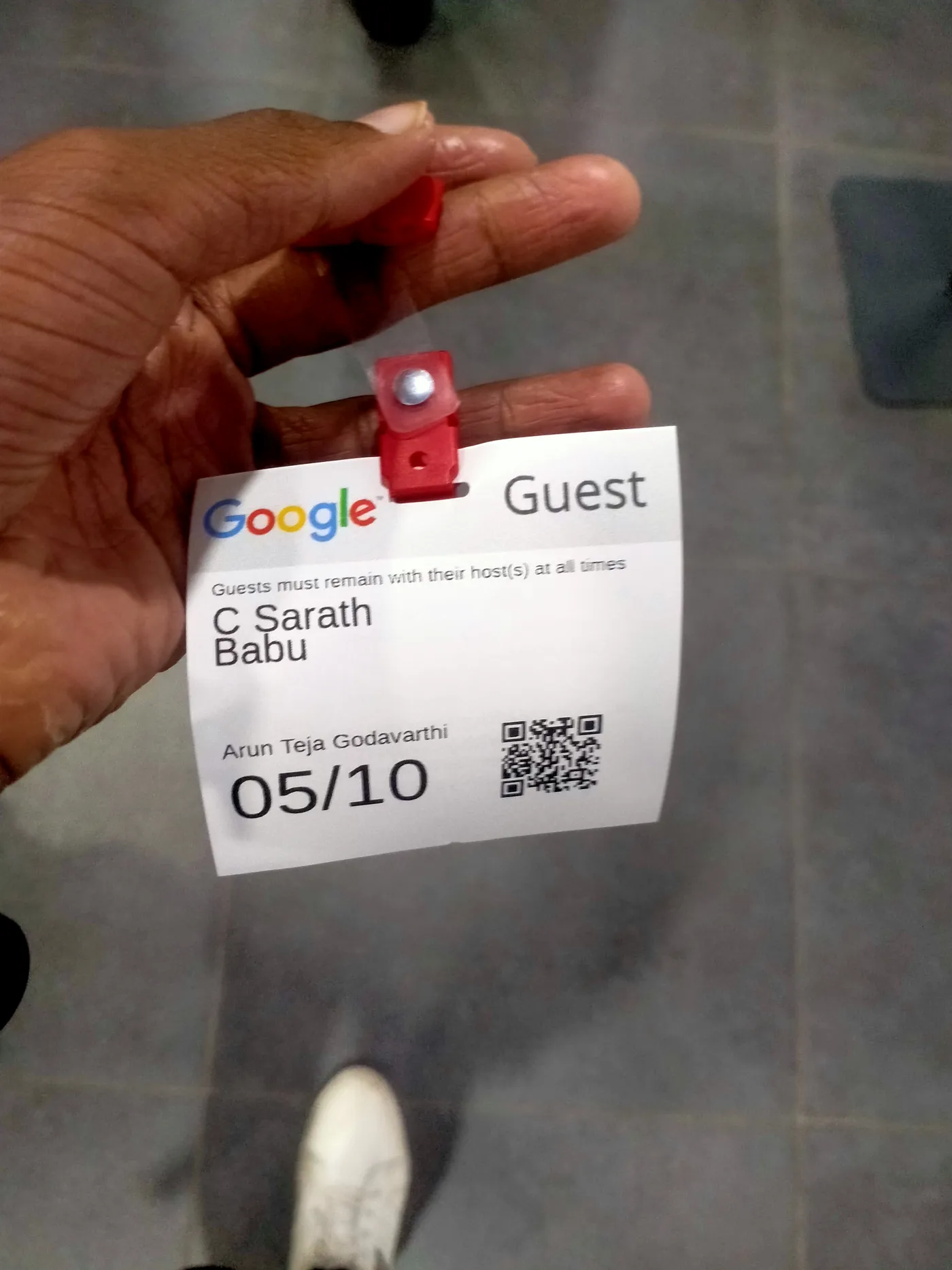 C Sarath Babu's writing on Google I/O Extended Bengaluru, 2023. A Google guest badge printed with his name
